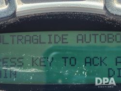 2572077